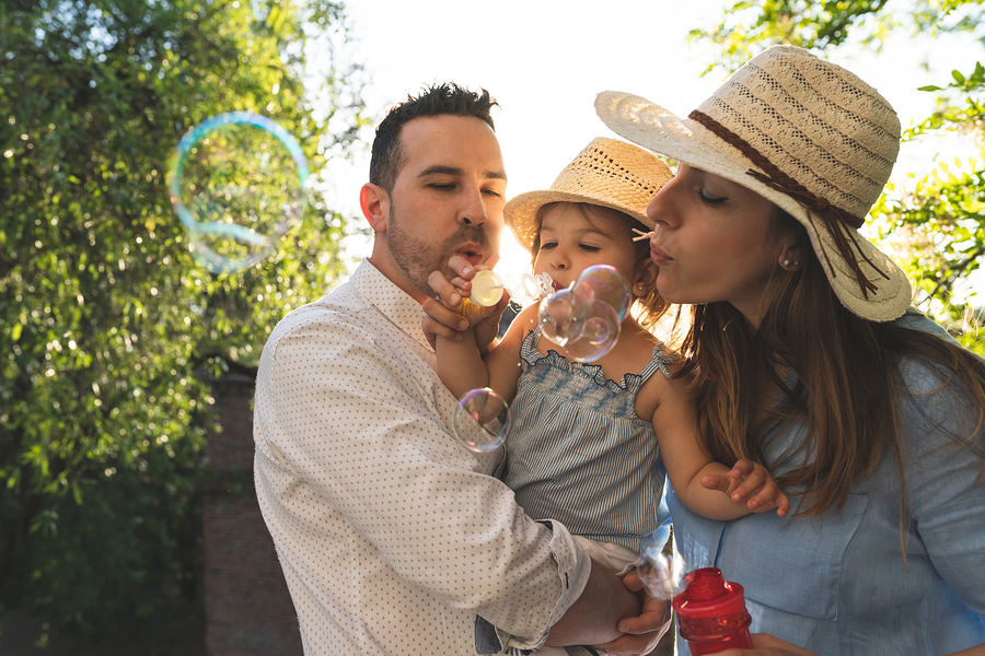 Happy Family Having Fun Together Outdoors